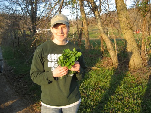 Ashley with some wild watercress picked fresh on our family farm in Kentucky